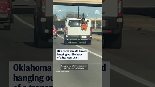 Oklahoma inmate filmed hanging out the back of a transport van