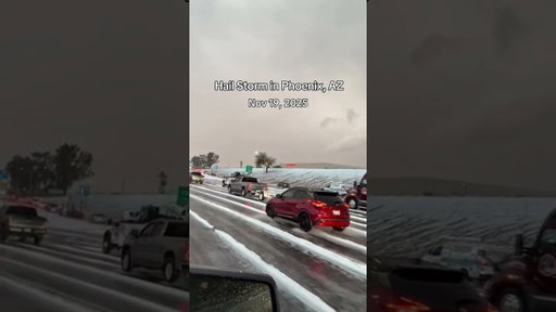 A hail storm is covering the road around the I-10 and 75th Ave in Phoenix, AZ, making it look