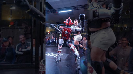 Human vs. Mini robot fight