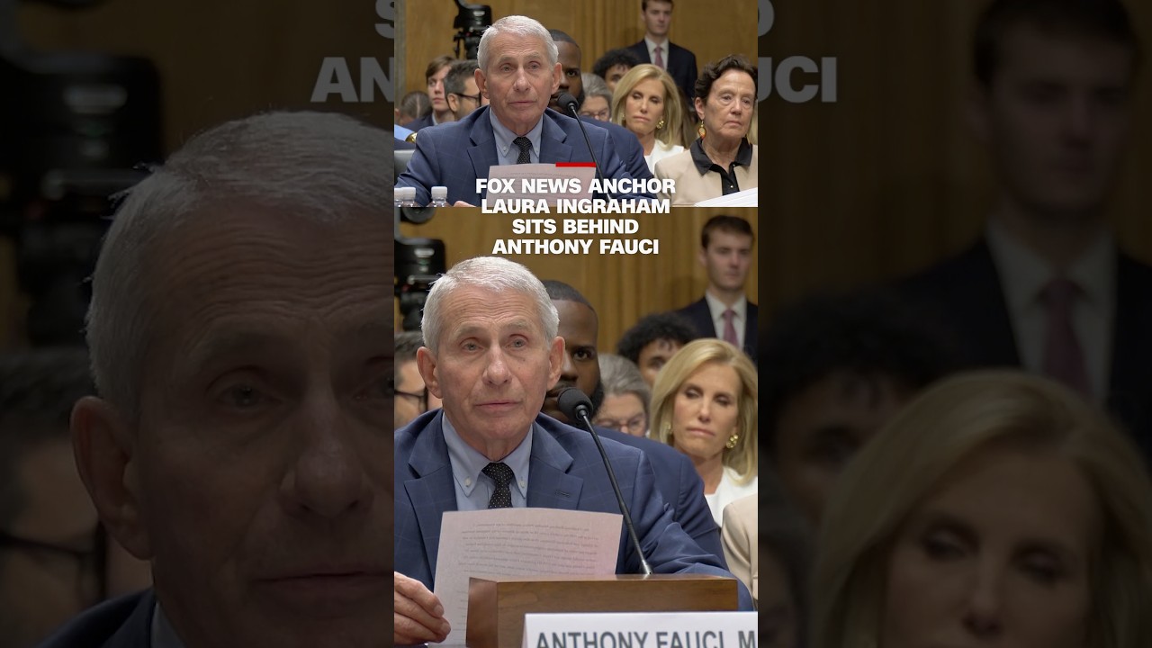 Fox News anchor Laura Ingraham sits behind Anthony Fauci