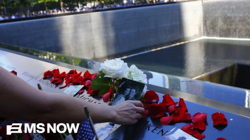 Moment of silence held at 9/11 Memorial marking time the South Tower was hit