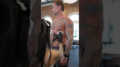 CM Punk gets a Larry Tattoo
