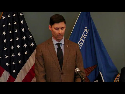 Special Agent in Charge W. Mike Herringtonn announces capture of Most Wanted Fraudster