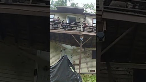 U.S. Marshals fall during SWAT raid when porch gives way