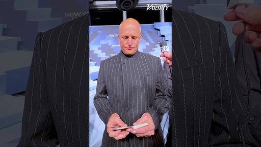 Woody Harrelson shows off a magic trick at the 'Now You See Me: Now You Don’t' premiere.