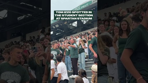 Tom Izzo vists the student section at Spartan Stadium