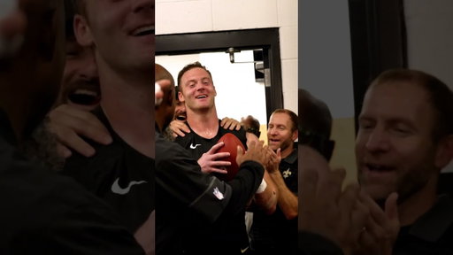 Kellen Moore Celebrates Win, Hands Out Game Balls