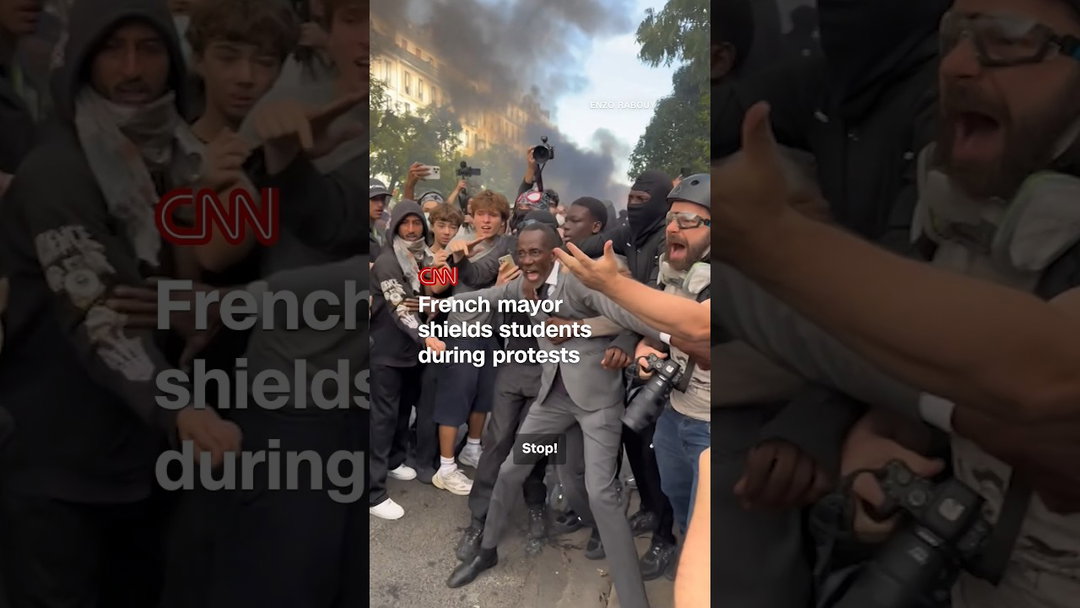 French mayor shields students during protests
