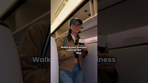 Walking past a RUDE business class passenger