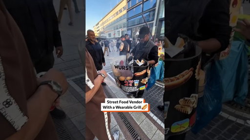 Street food vendor with a wearable grill 🌭🤩 #StreetFood #Foodie #Sausage