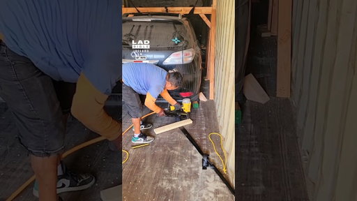 Nailing the wood in place