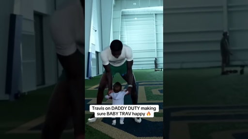 Travis on daddy duty for baby Trav before the adidas commercial 🔥