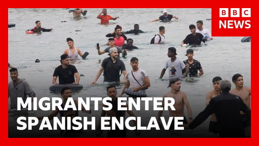 Thousands of migrants try to enter Spanish enclave of Ceuta from Morocco | BBC News