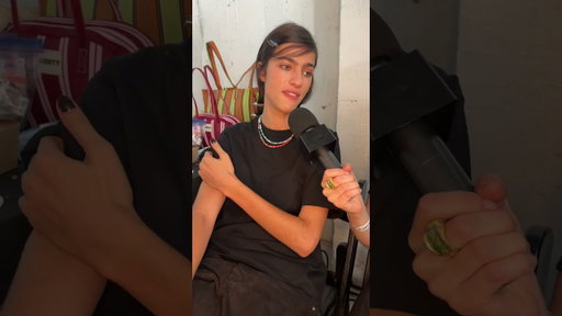 Loli Bahia serves model runway face