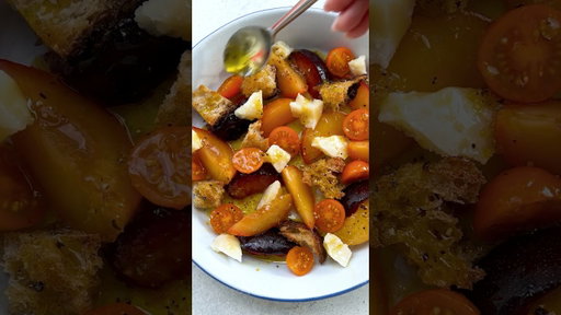 Tomatoes, Parmesan, bread, and stone fruit all in one bowl? Yes, please.