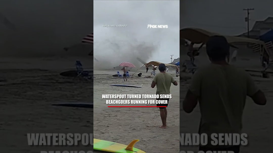 Waterspout turned TORNADO sends beachgoers running for cover #shorts #us #news