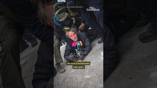 This photographer was tackled by ICE – and threw his camera to save it