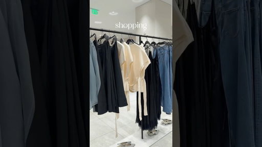 buying new clothes at the mall.
