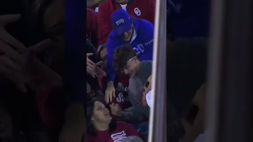 These Oklahoma fans worked together to toss a TCU branded football out of the stadium 😂